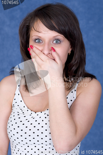 Image of Young woman to be open-mouthed with surprise