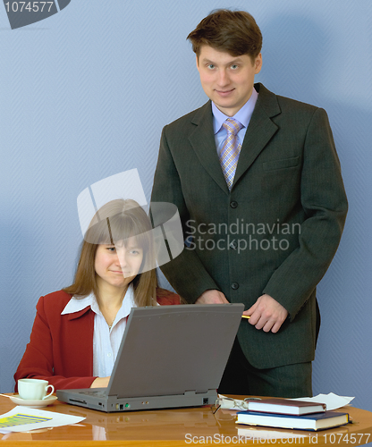 Image of Girls at a desktop and their chief