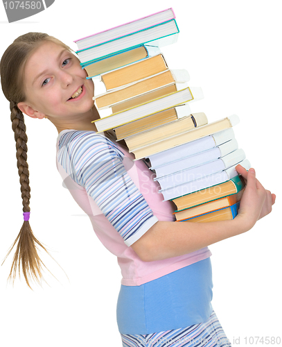 Image of Schoolgirl with the big pile of books in hands