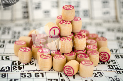 Image of Wooden counters of bingo on cards