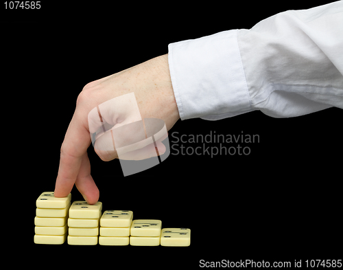 Image of Ascension on a pedestal from dominoes