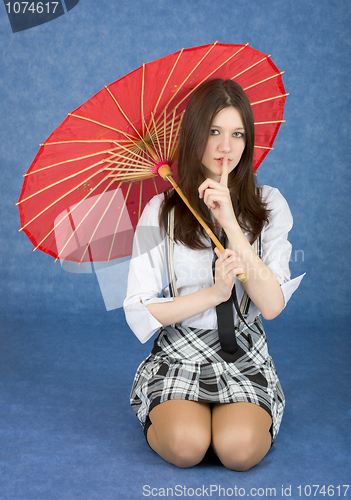 Image of Beautiful girl with the Chinese umbrella