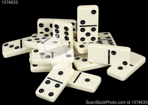 Image of Small group from dominoes counters on a black