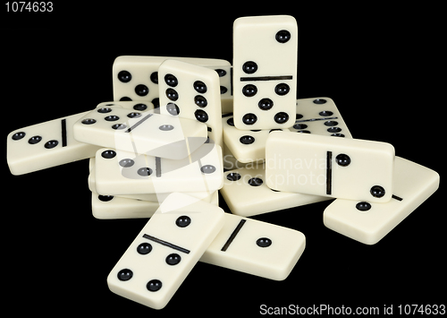 Image of Small group from dominoes counters on a black