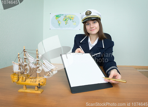 Image of Girl - sea captain with a tablet and pen