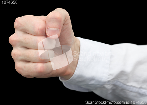 Image of Fist it is isolated on a black background