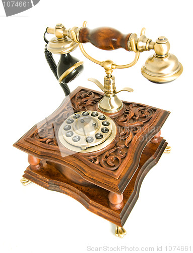 Image of Antique telephone isolated over white