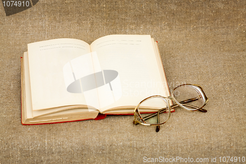 Image of Ancient book and spectacles