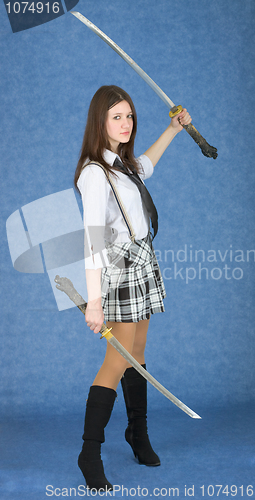 Image of Girl with two swords on a blue background