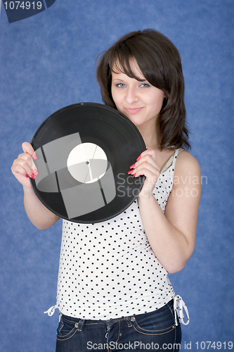 Image of Portrait of the girl with a phonograph record