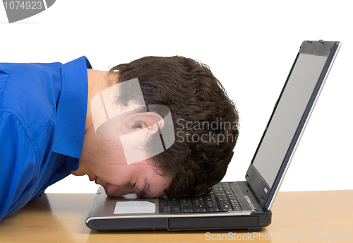 Image of Young man and laptop