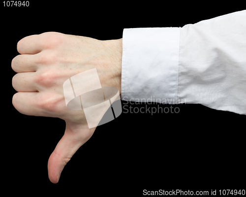 Image of Man's hand showing gesture on a black