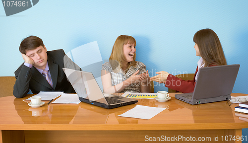 Image of Businessman has fallen asleep sitting at meeting