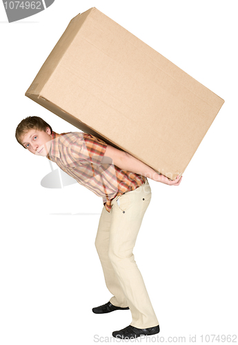 Image of Young man bears the big box on a back