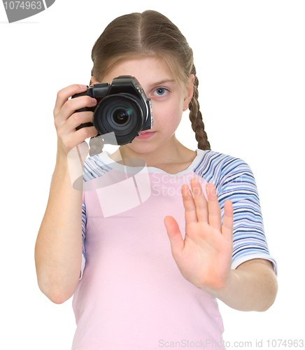 Image of little girl with the camera