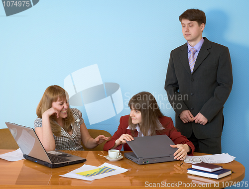 Image of Girls at a desktop and their chief