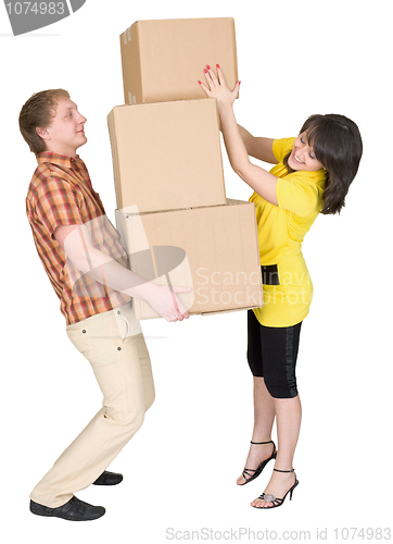 Image of Girl loads the man with cardboard boxes