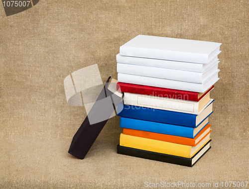 Image of Multicolor books on the fabric background