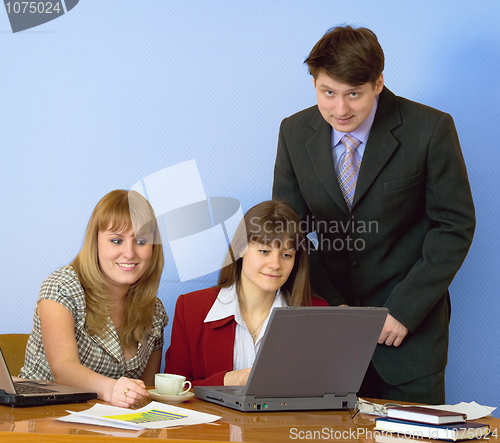 Image of Girls at a desktop and their chief