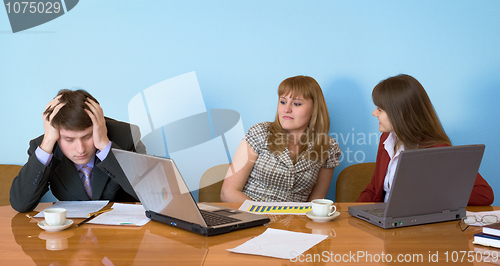 Image of Businessman has fallen asleep sitting at meeting