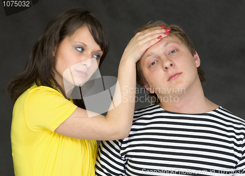 Image of Girl to take the temperature boy