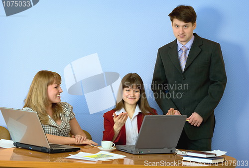 Image of Girls at a desktop and their chief