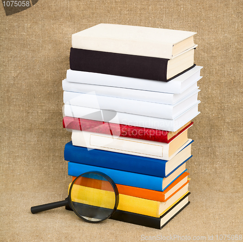 Image of Books and magnifying glass