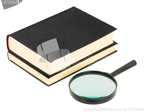 Image of Books and magnifying glass