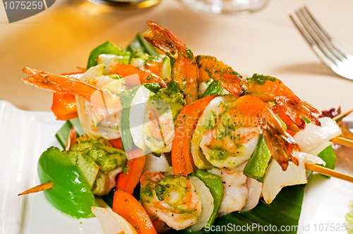 Image of shrimps and vegetables skewers