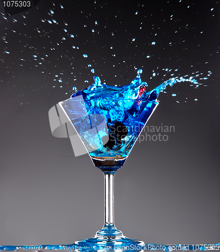 Image of blue cocktail splashing 