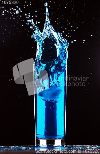 Image of blue cocktail splashing 