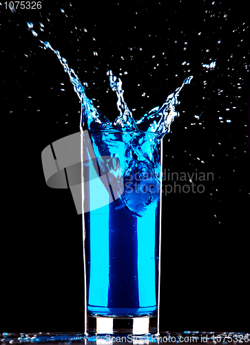 Image of blue cocktail splashing 