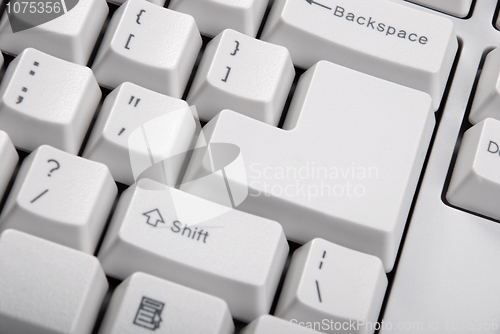 Image of Keyboard with a big empty button