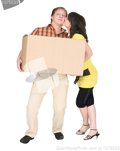 Image of Girl kisses the guy holding a box