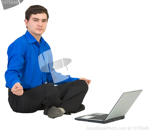 Image of Guy in a lotus pose with the laptop