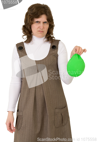 Image of Young woman with blow off balloon