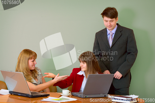 Image of Girls at a desktop and their chief