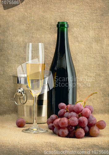 Image of Still-life with champagne wine and grapes