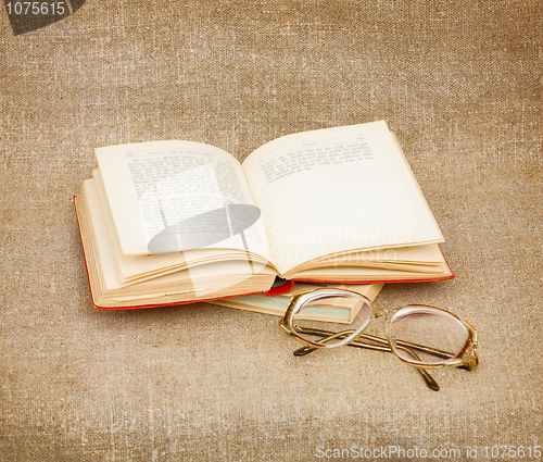 Image of Still-life from eyeglasses and book