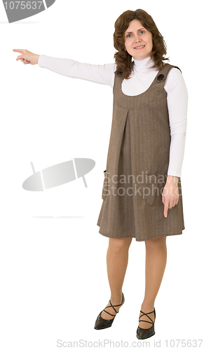 Image of Young woman points to the left