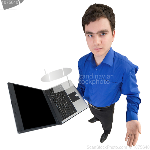 Image of Young businessman with the laptop