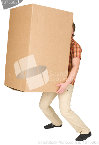 Image of Young man bears the big box on a back
