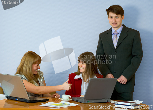 Image of Girls at a desktop and their chief