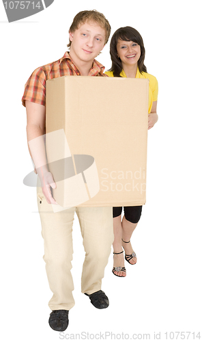 Image of Woman and man bear the big cardboard box