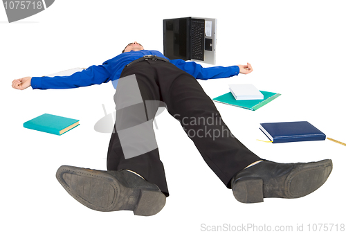 Image of Businessman lies on a floor among the things