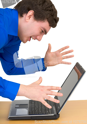 Image of Young man and laptop