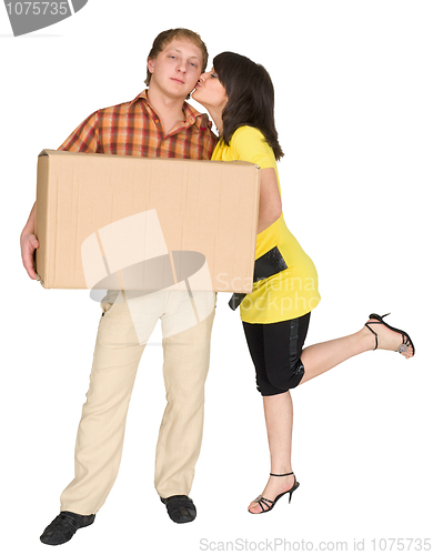 Image of Girl kisses the guy holding a box