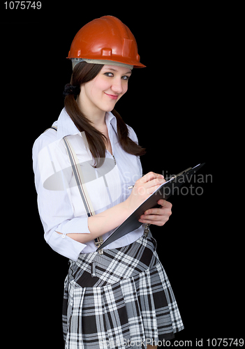 Image of Girl in a helmet with a tablet in hands