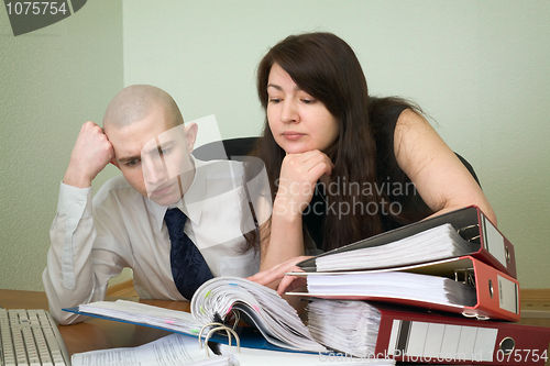Image of Clerk and the secretary on a workplace