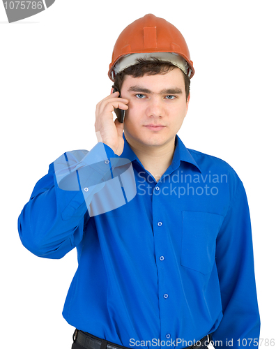 Image of Man in a helmet speaks on the phone